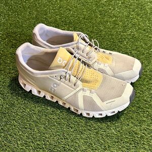 On Running Light Tan and White Athletic Shoes